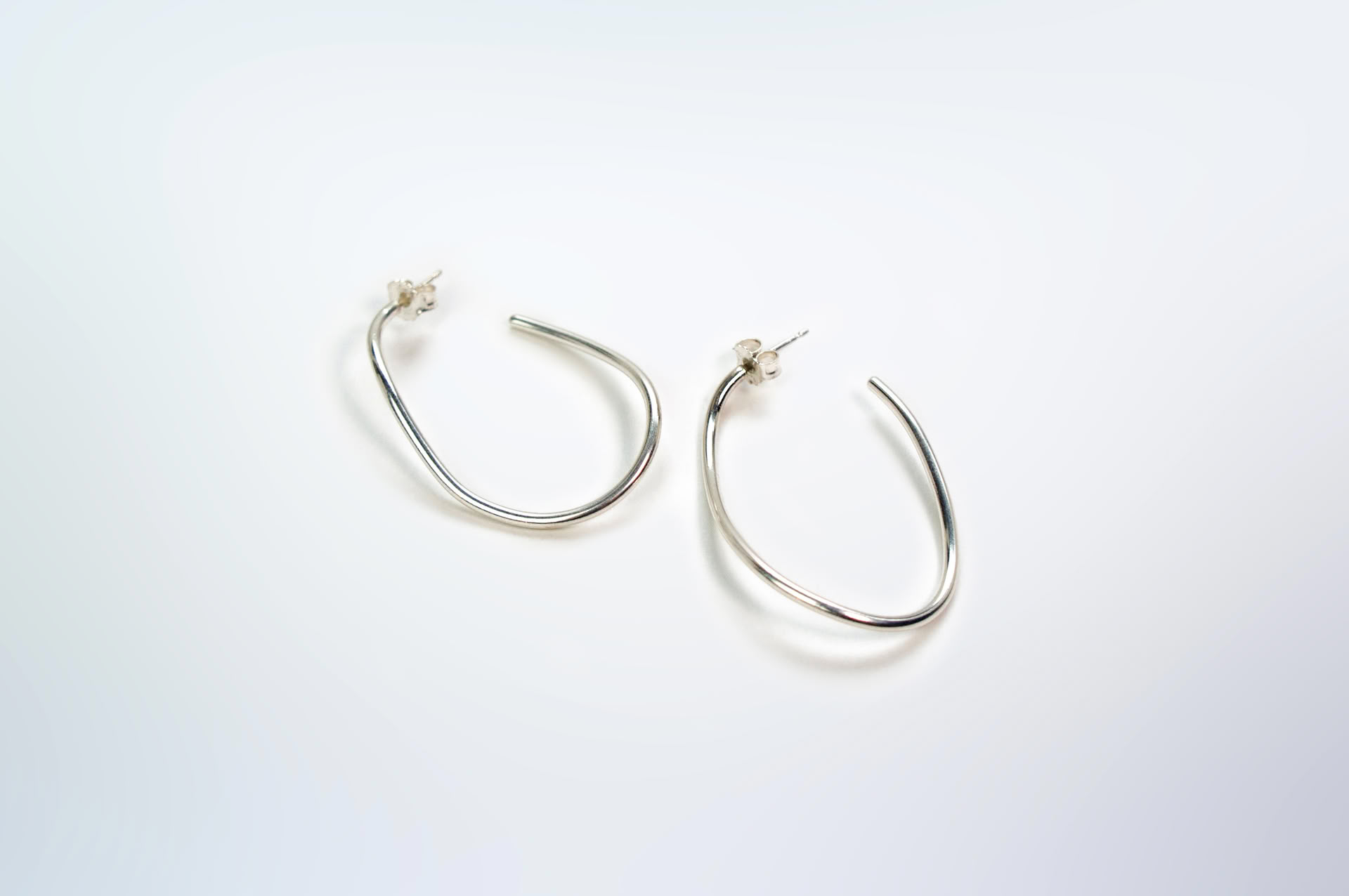 Hadou wavy hoops in sterling silver