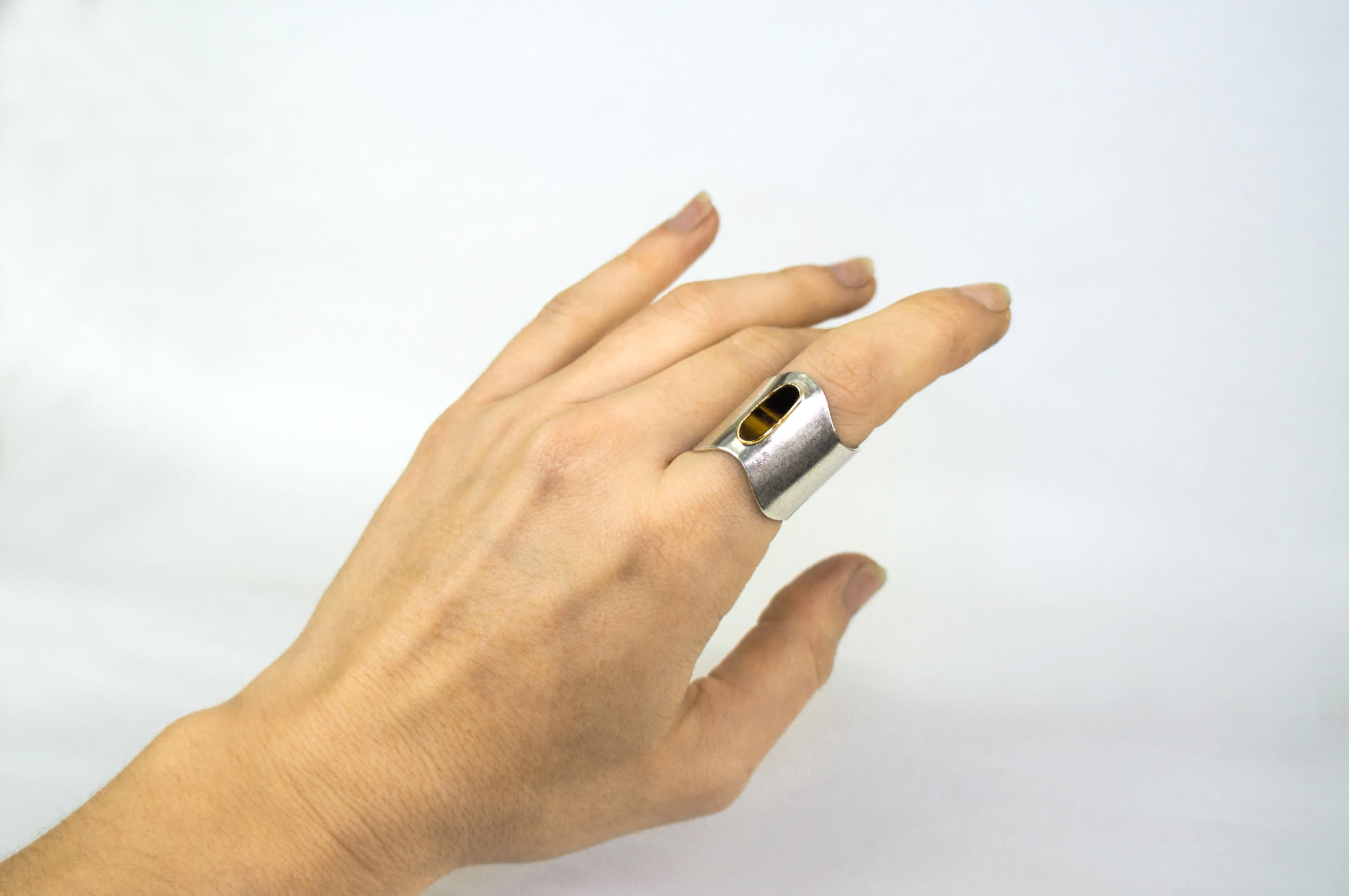 Rokku wide silver ring with tiger eye set in 18k gold