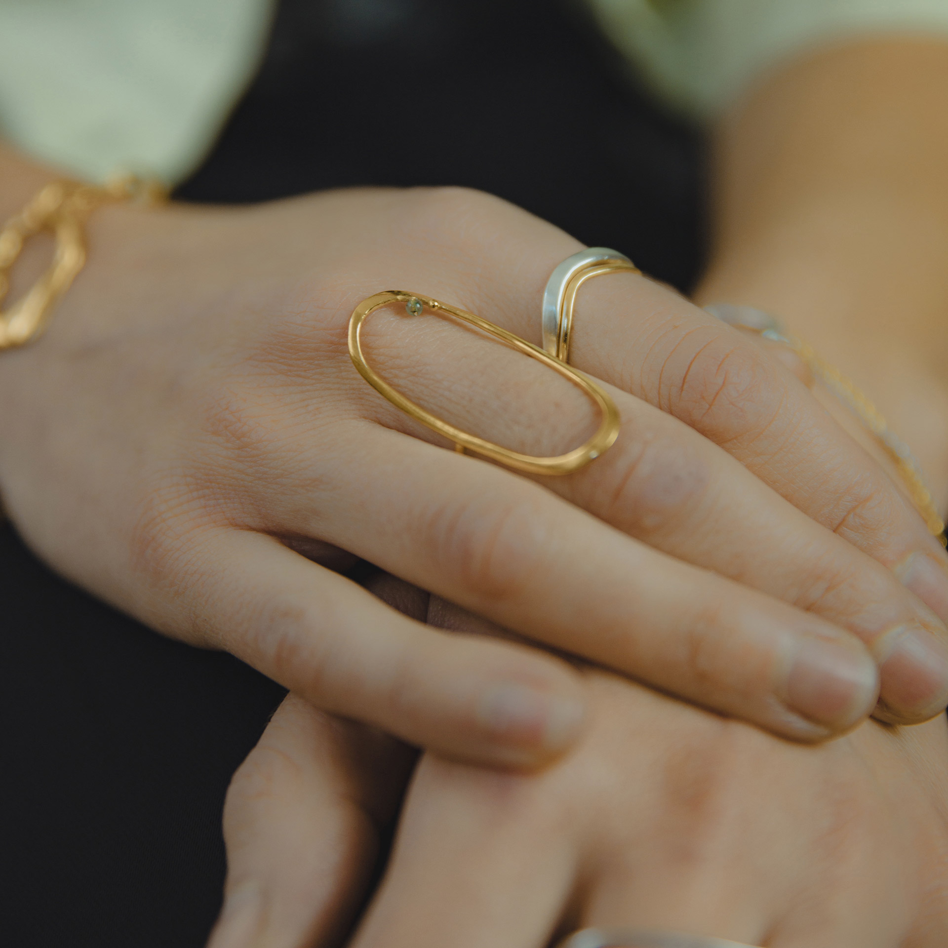 BoroBoro long oval ring in gold plated silver with tiny aventurine bead.