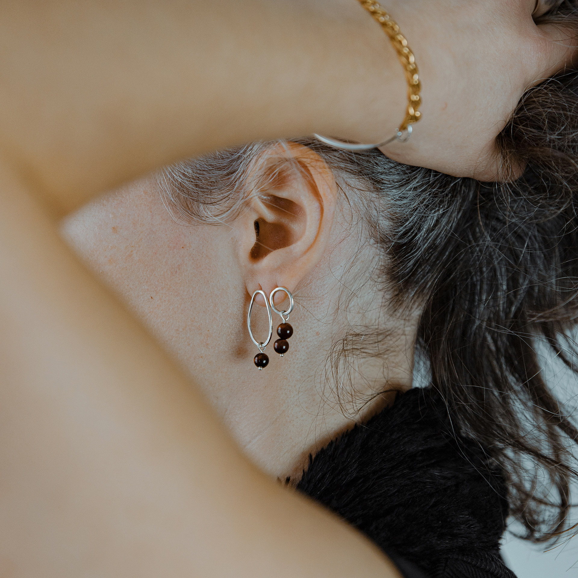 Boroboro asymmetrical silver bead earrings with tiger's eye.